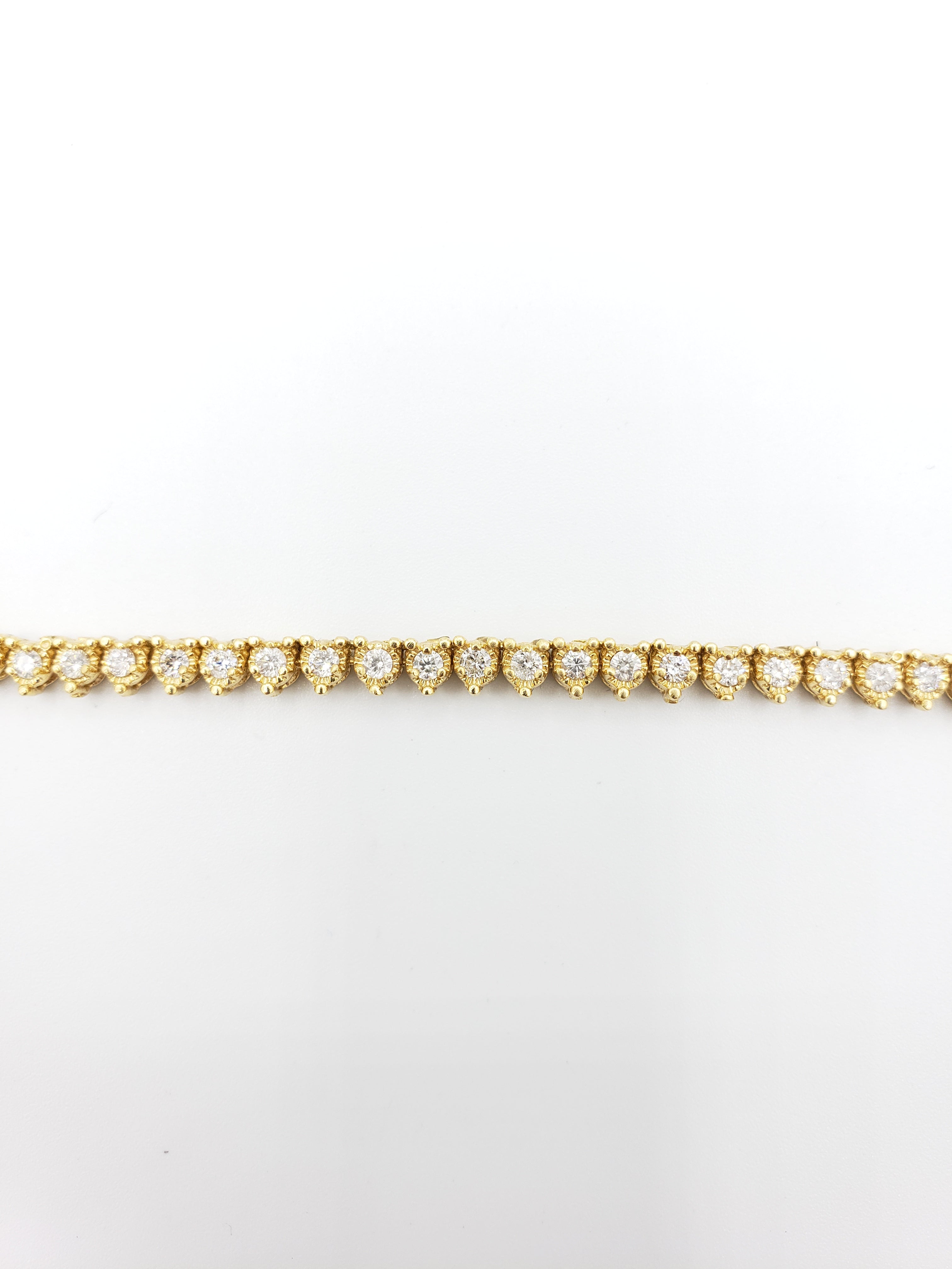 14K Gold- Diamond Pointer Tennis Chain 40.3 Grams